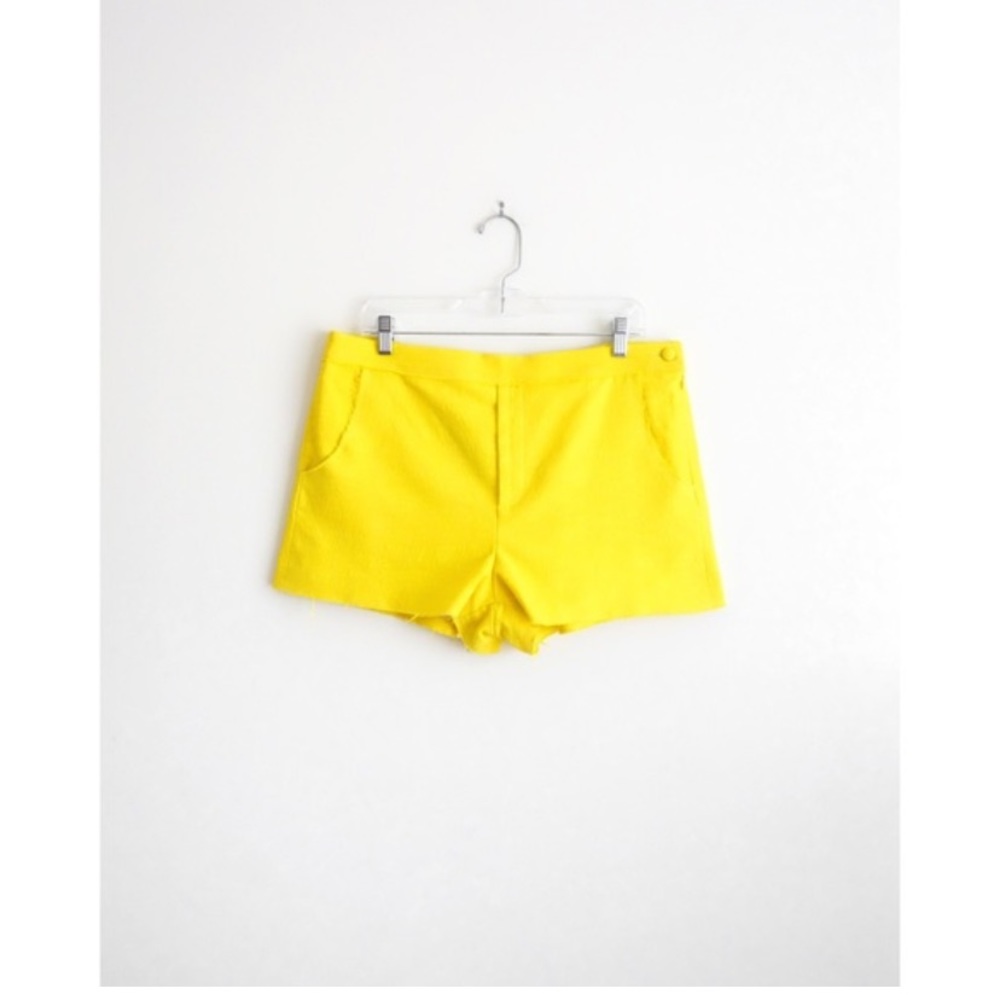 Gorgeous girl. Band of Outsiders size 3 bright yellow shorts